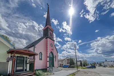 Image de Pink Church- One of a kind with historic charm and modern amenities incl. Tesla charger!