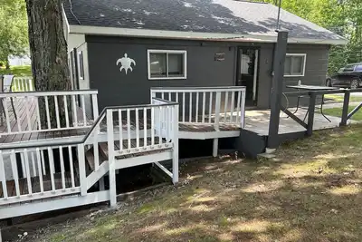 Image de Cozy cottage in Glennie Mi on all sports North Lake with deck, dock & firepit.