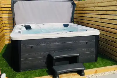 Image de The Red Lodge Annexe \nOne bedroom rental with private hot tub.