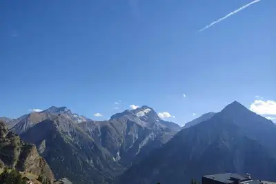 Image de 7ème étage, vue montagne, balcon, parking, télévision, casier à ski, 25m², Les 2 Alpes