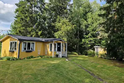 Image de Cottage by the lake with its own jetty and boat