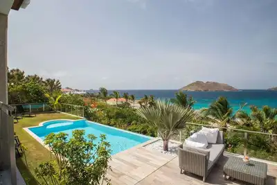 Image de Estrela- Modern & spacious, Beautiful beach & ocean views, walk to the beach