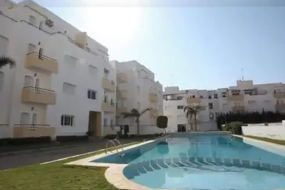Image de Appartement avec piscines, vue sur mer et accès à la plage