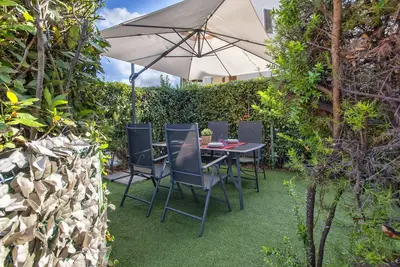 Image de Appartement 'Gio's' avec piscine partagée, jardin privé et climatisation