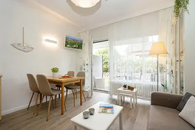 Image de 3-zimmer App. für 4 Personen mit Terrasse, Stellplatz, Wlan. Haustier Erlaubt