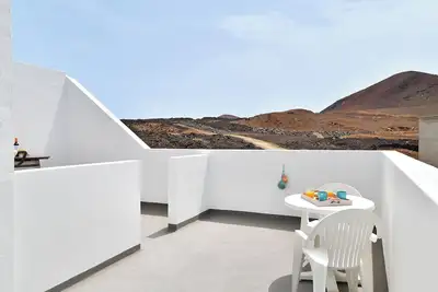 Image de Maison de vacances \"Viviendas El Pescador - Timón\" avec vue sur la mer, terrasse privée et Wi-Fi