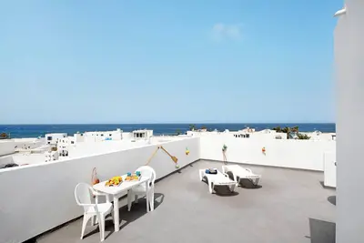 Image de Maison de vacances \"Viviendas El Pescador - Remo\" avec vue sur la mer, terrasse privée et Wi-Fi