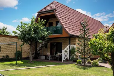 Image de Cozy vacation apartment with 2 balconies, 2 bedrooms, well-kept garden, Wlan, bicycles