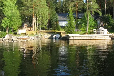 Image de Wonderful comfort log home right on the lake