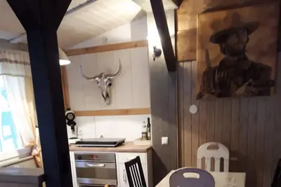Image de Cowboy Cottage vacation apartment (43 sqm) with veranda and barbecue facilities