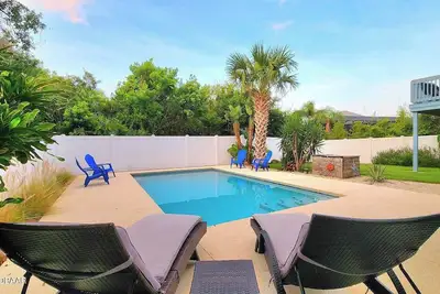Image de Amazing Tropical Pool Home with Breezy Outdoor Living Space just Steps to Beach.