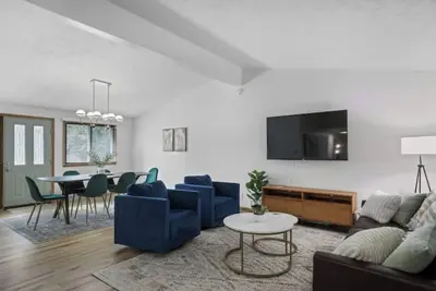Central Location+ 2 living spaces+ covered patio!
