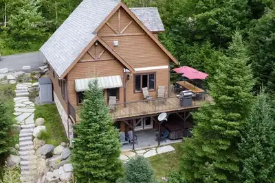 Image de Chalet L'Agréable, bord de lac, air, spa et Golf.
