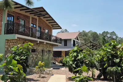 Image de Tinyhouses and Tropical Gardens Con Paisaje a la Montaña, a 25 min del Airport