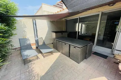 Image de Appartement Climatisé en Rez-de-Jardin avec Parking, à 50m de la Plage de la Roquille