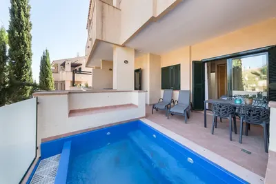 Image de Appartement de vacances \"El Oasis Malasia 16 Bajo A\" avec piscine partagée, terrasse privée et Wi-Fi