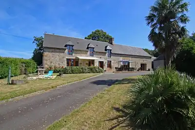 Image de Maison conviviale avec spa, sauna, baby-foot et grand jardin près du Mont Saint-Michel