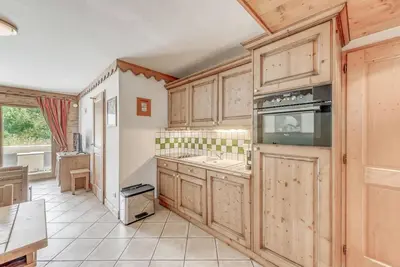 Image de 1er étage, vue montagne, piscine, sauna, hammam, terrasse, parking, télévision, casier à ski, 58m²