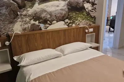Image de Hotel Le 2 Gravine Matera Triple Torrent Room with Private Bathroom