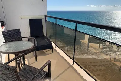 Beach front Top renovated 2 bed apartment with 3 Pools