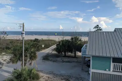 Image de The Lucky Dog Beach House steps from the beach.
