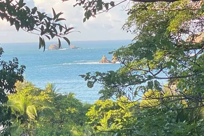 Image de Hear the waves from either pools or patios, or walk to the beach, ocean views