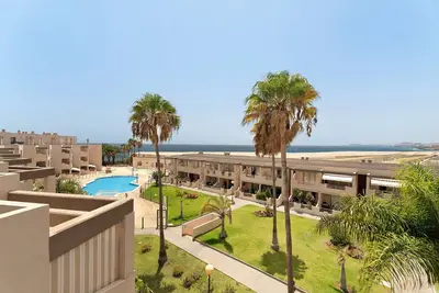 Image de Maison de vacances 'Duplex Tejita Beach' avec piscine partagée, balcon et Wi-Fi