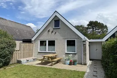 Image de Comfortable 5-person holiday home, spacious enclosed garden, WiFi on quiet holiday park close to beach, woods and dunes, pet allowed