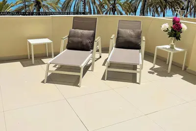 Amazing beach front 2 bed Apartment with 100 kvm private terrace.