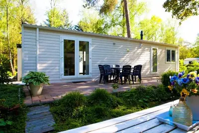 Image de Chalet entretenu dans un parc de vacances, à côté du parc national Hoge Veluwe