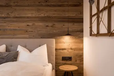Image de Appartement de vacances 'Obergasserhof GipfelstĂĽrmer' avec vue sur les montagnes, jardin et Wi-Fi