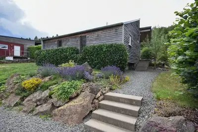 Image de Maison dans la forêt avec terrasse et Bbq