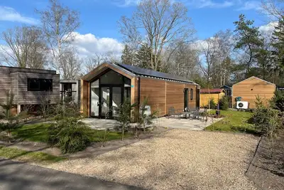 Image de Chalet confortable avec lave-vaisselle, adjacent au parc national Hoge Veluwe