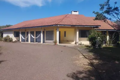 Image de Casa em Torres com Linda Vista Para a Lagoa da Itapeva - a 5 min da Praia!