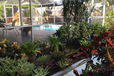 Image de Peaceful South Venice Home in Tropical Garden Setting.