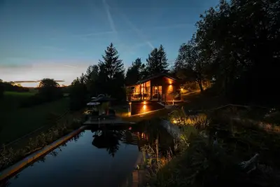 Image de Vacation home in the Schwabische Alb with swimming pond and sundeck. \n\n