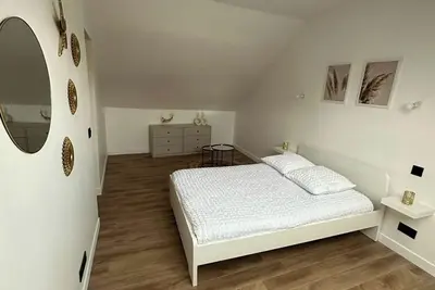 Image de Maison neuve aux chambres chic et bohème