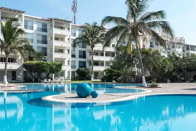 Image de Amazing apartment, view of the beach and sunsets. Families 4 bedrooms/ bathrooms