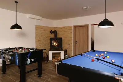 Image de Confortable appartement pour 5 personnes avec Wifi, bain à remous et Tv