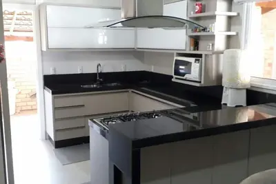 Image de Casa Aconchegante a Poucos Metros da Praia de Zimbros