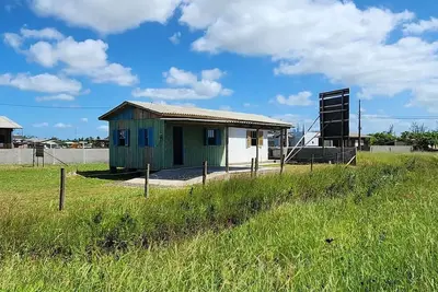 Image de Casa de Praia a Alguns Metros do mar Tranquilidade e Conforto Para sua Família