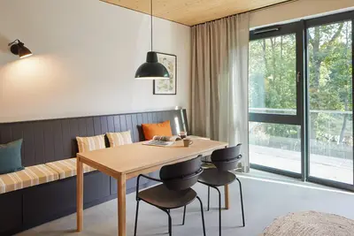 Image de Two-story maisonette with a view of the greenery.