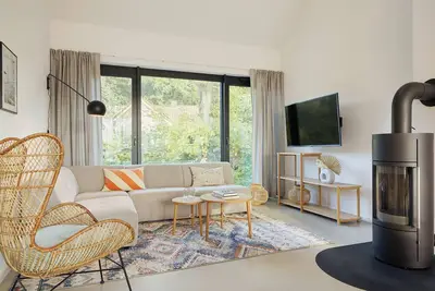 Image de Luxury loft apartment with rooftop terrace and fireplace.