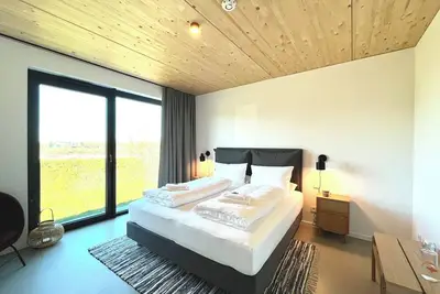 Image de Spacious, light-filled holiday apartment in cottage style.