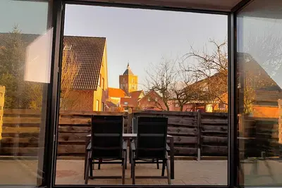 Image de Schöne Ferienwohnung Zum Kleinen Leuchtturm im Gulfhof Pilsum