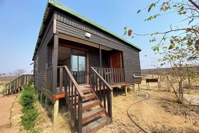 Image de Cozy wooden cabin overlooking the foot of the Tswapong Hills in Palapye.