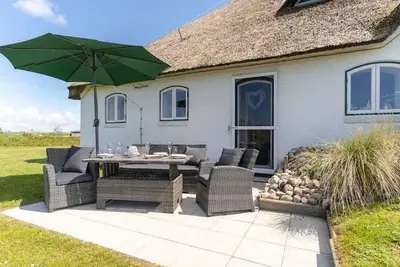Image de Friesenhof Apartment 4 Seesternchen