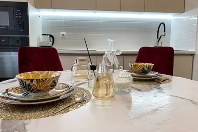 Image de Апартаменты с современным дизайном, с элементами нашей национальной культуры. \n