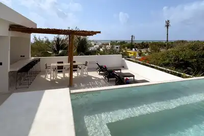 Image de Newly build 2 bedroom, luxury apartment a few steps from beach.