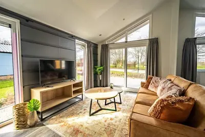 Image de Chalet moderne dans un parc de vacances, en bordure du parc national Hoge Veluwe